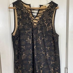 Never worn.  Boutique blouse tank